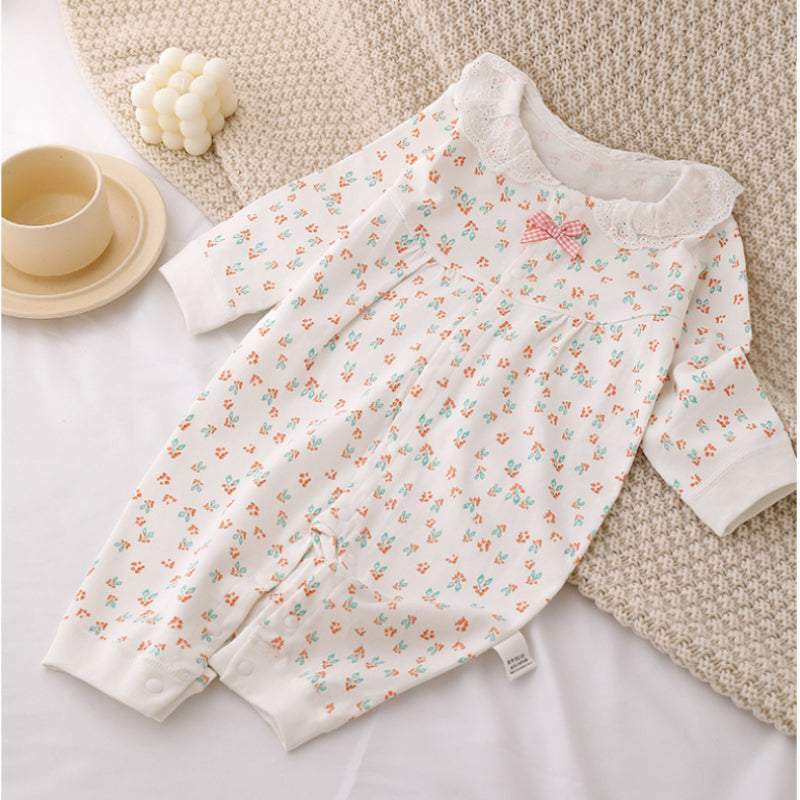 Baby one-piece romper white flower on the floor