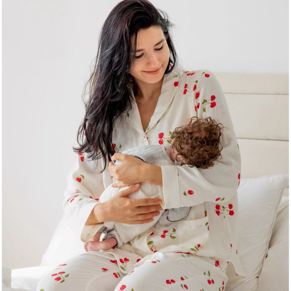 model wearing cotton maternity pajama set with a baby